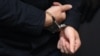 GERMANY -- Stephan Balliet, who is accused of shooting dead two people after an attempt to storm a synagogue in Halle an der Saale, eastern Germany, has his hands cuffed as he arrives into the courtroom 