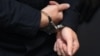 GERMANY -- Stephan Balliet, who is accused of shooting dead two people after an attempt to storm a synagogue in Halle an der Saale, eastern Germany, has his hands cuffed as he arrives into the courtroom 