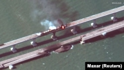 Крымский мост 8 октября 2022 года. Спутниковый снимок компании MAXAR. Источник: Reuters