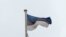 Estonia -- Estonian flag and Estonian coat of arms on the Estonian Parliament Building, Riigikogu.