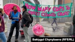 Экологические активисты в Глазго во время саммита. Фото: Reuters