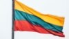 LITHUANIA – Lithuanian flag over the city of Kaunas, which is located 104 kilometers from the capital of Lithuania