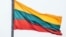 LITHUANIA – Lithuanian flag over the city of Kaunas, which is located 104 kilometers from the capital of Lithuania