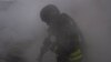 Ukraine -- Rescue workers fighting fire in Sumy region after a Russian strike, 15May2025 