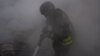 Ukraine -- Rescue workers fighting fire in Sumy region after a Russian strike, 15May2025 