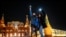 RUSSIA -- Young people turn on the flashlights of their mobile phones in support of jailed opposition politician Alexei Navalny near Red Square in Moscow on February 14, 2021.