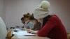 Russia/Uzbekistan - migrants pass an exam from Russian history, language and legislation of the Russian Federation in school educational training of migrants at People's Friendship University of Russia