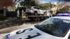 A tow truck removes a car after it was driven into the gates of the Russian consulate in Sydney on September 1, 2025.