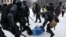 RUSSIA – Russian police officers detain protester during an unauthorized protest in support of Russian opposition leader Alexei Navalny, in St. Petersburg, Russia, 31 January 2021