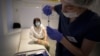 RUSSIA -- A healthcare worker prepares a dose of Russia's Sputnik V Covid-19 vaccine, at a vaccination centre in Moscow, July 2, 2021