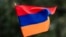 TOPSHOT - A child waves an Armenian flag as Armenians protest against Azerbaijan's offensive in Nagorno-Karabakh, at Place du Canada in Montreal, Quebec, Canada, on October 1, 2023.